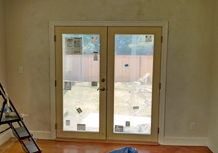 French doors built in place of windows by West Coast Restoration